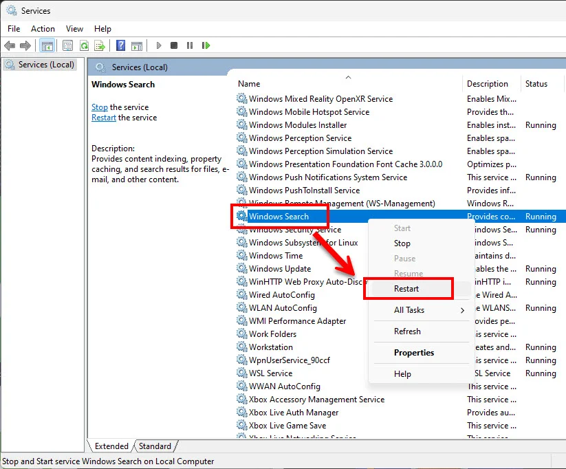 ภาพหน้าต่างเครื่องมือ Services ของ Windows ในธีมสว่าง โดยมีการเน้นรายการ "Windows Search" ด้วยกล่องสีแดง และมีลูกศรชี้ไปยังเมนูคลิกขวาที่เปิดอยู่ ซึ่งเน้นตัวเลือก "Restart" ด้วยกล่องสีแดงอีกอันหนึ่ง แสดงขั้นตอนการรีสตาร์ทบริการค้นหา