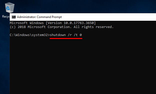 หน้าต่าง Administrator: Command Prompt บน Windows Server 2019 แสดงบรรทัดคำสั่ง shutdown /r /t 0 ที่มีเส้นใต้สีแดงเน้นที่ส่วนของคำสั่ง (restart with 0 second timer) สำหรับการสั่งการรีสตาร์ทระบบทันที